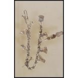 A silver charm bracelet having musical instrument charms to include trumpets, harp, bell violin,