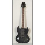 A Stagg G300 SG style six string electric guitar having black body with mother of pearl fret markers