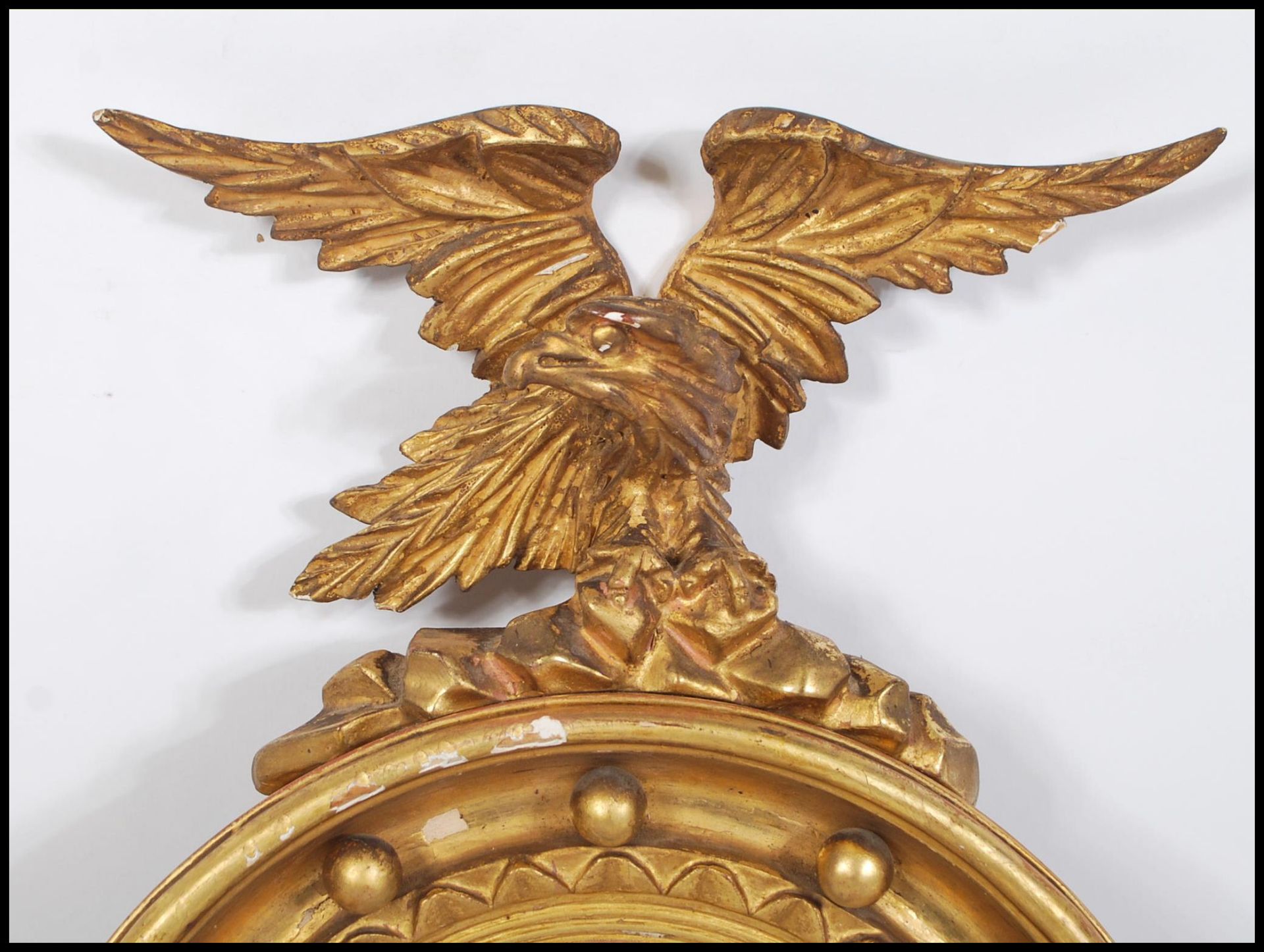 A 19th century gilt wood and gesso convex porthole mirror applied with eagle atop. The circular - Bild 3 aus 4