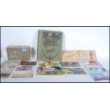 A selection of vintage ephemera to include a selection of postcards and greetings cards to include