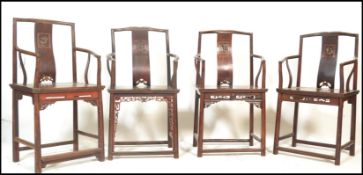 A set of four late 19th Century near matching Chinese horseshoe armchairs / elbow chairs. Each
