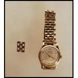 A hallmarked 9ct gold vintage Swiss sixteen jewel Tissot Antimagnetique gents wrist watch, having