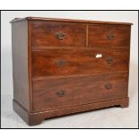 A late 19th / early 20th Century mahogany chest of drawers having two shot drawers over two long