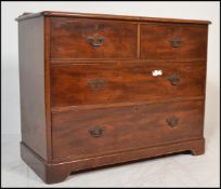 A late 19th / early 20th Century mahogany chest of drawers having two shot drawers over two long