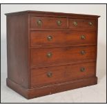 An Edwardian mahogany chest of drawers having two short drawers over three deep drawers with brass