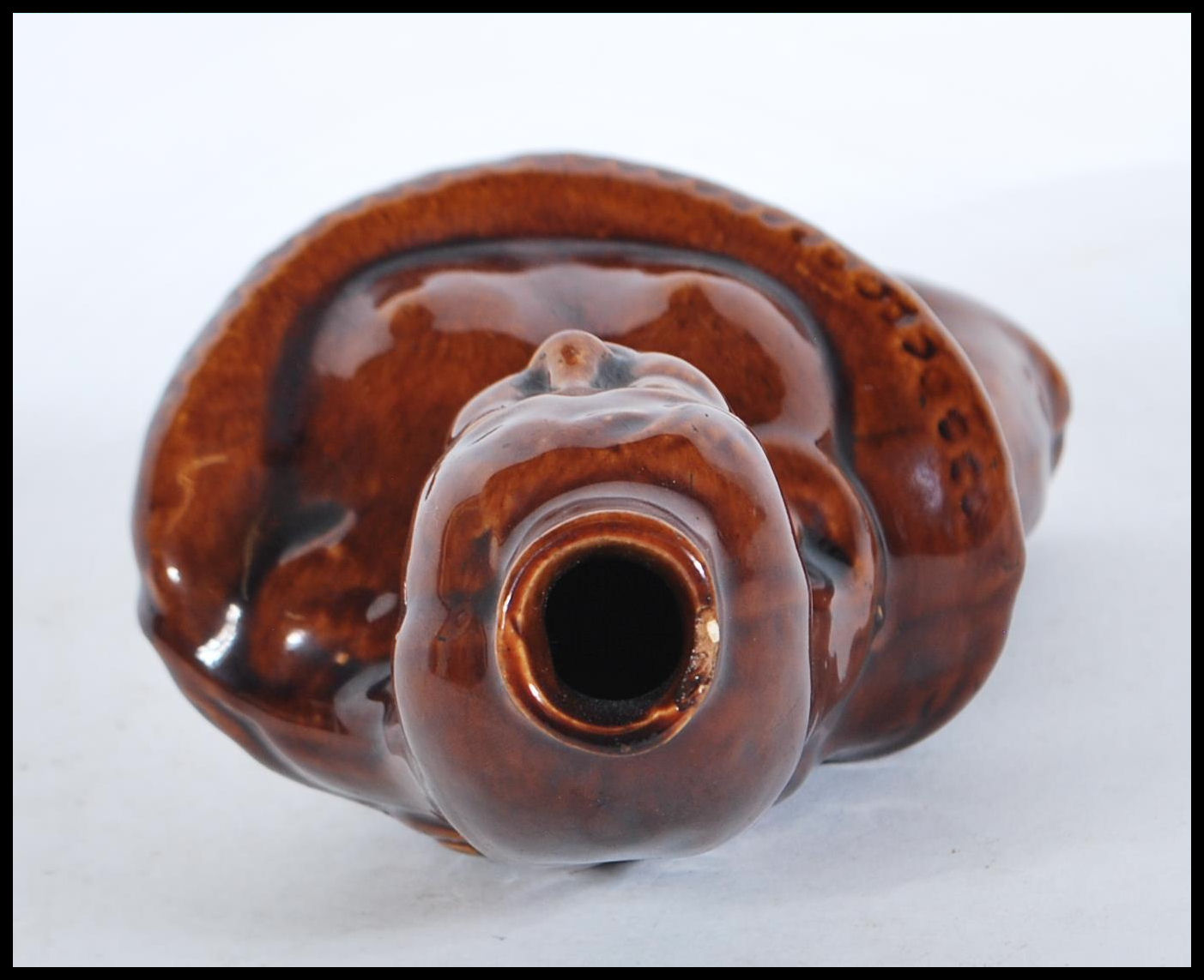 A mid 19th century treacle glaze gin flask in the form of a mermaid. Circa 1840, with waisted top - Image 5 of 6