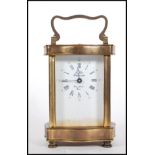 A 20th Century French Gilt Brass Carriage Clock By L`Epee, The enamel dial with Roman & arabic