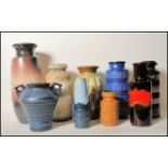 A group of nine vintage 20th century retro West German fat lava style pottery vases of a selection