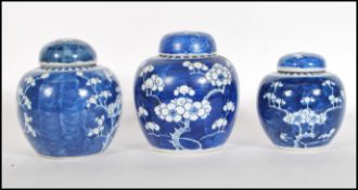 A 19th Century Chinese blue and white porcelain prunus ginger jar and cover having double blue rings