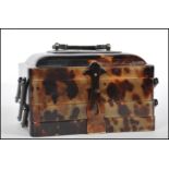 A mid 20th Century 1940's / 50's faux tortoiseshell three section jewelry box, having horn