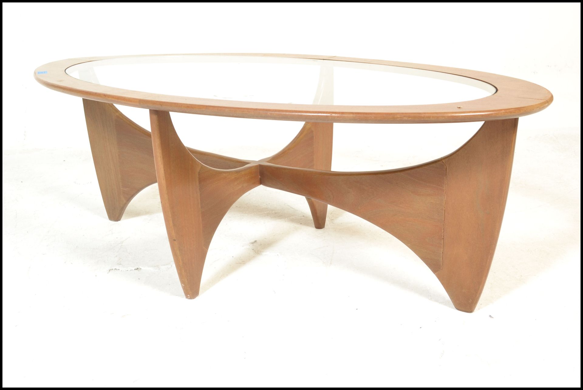 A 1950's mid century teak wood Danish influence coffee table of sputnik / Astro form. Inset glass - Bild 5 aus 6