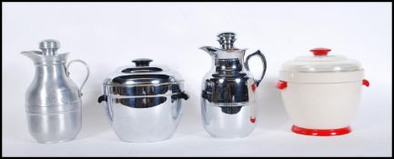 Two vintage retro Thermos ice buckets to include a chromed example with bakelite handles and a cream