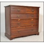 A Victorian 19th century oak  / ash 2 over 3 chest of drawers. Raised on a plinth base having 2