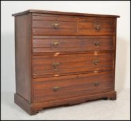 A Victorian 19th century oak  / ash 2 over 3 chest of drawers. Raised on a plinth base having 2