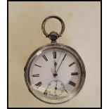 A silver hallmarked open face pocket watch dating from the late 19th century,  having white enamel
