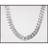 A hallmarked 925 silver heavy curb chain necklace having a lobster claw clasp. Measures 21.5 inches.