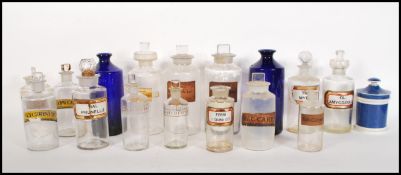 A collection of late 19th / early 20th Century apothecary chemist medicine glass jars most having