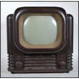 A stunning vintage circa 1950's / 20th Century  post war Art Deco bakelite Bush TV, brown marbled