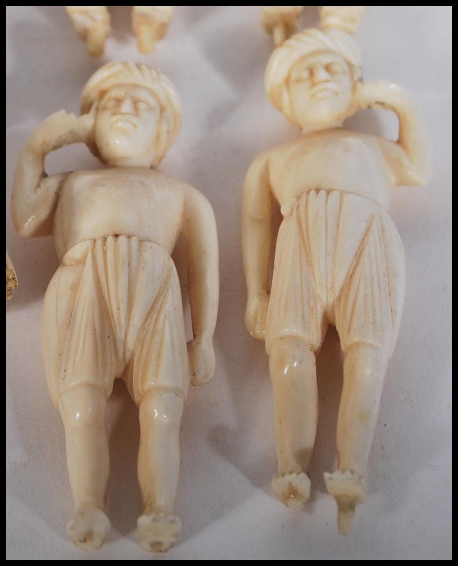 A group of late 19th Century carved ivory figurines to include Indian figures and animals - Image 9 of 12