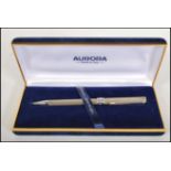 A stamped 925 silver ball point pen by Aurora, set inside a blue velvet lined box. Weight 20.6g.