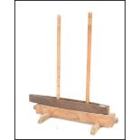 A 19th century Weaving / weavers stand of wooden form with turned uprights on stand having