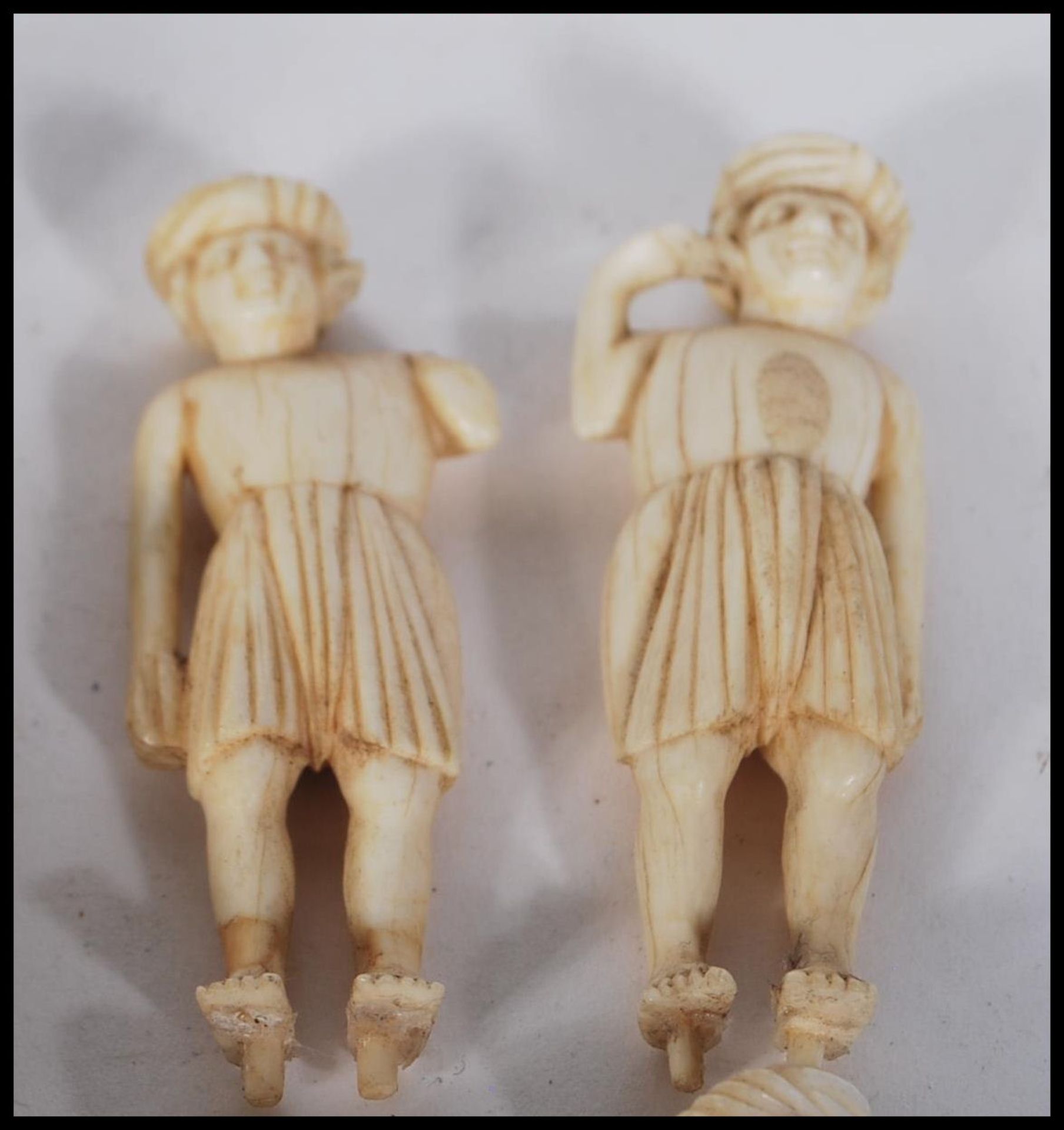 A group of late 19th Century carved ivory figurines to include Indian figures and animals - Image 10 of 12