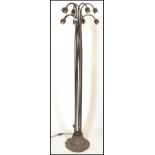 A 20th century multi branch metal multi flower upright floor standard lamp. Each tubular metal