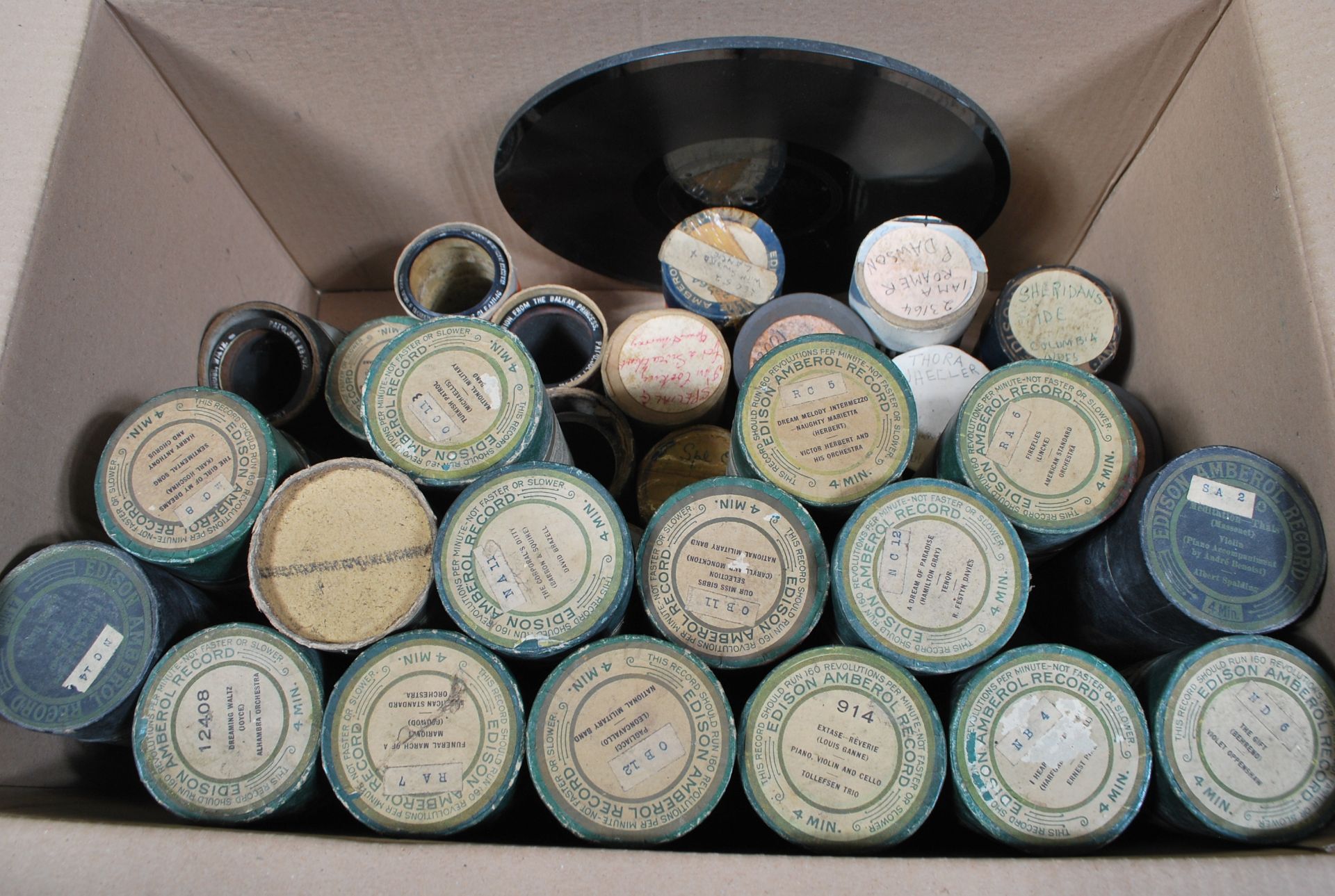 A good collection of approximately 40 + Edison  Phonograph wax cylinder rolls in cases featuring