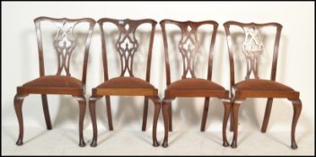 A set of 4 late 19th century mahogany Chippendale revival dining chairs. Raised on cabriole legs
