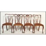 A set of 4 late 19th century mahogany Chippendale revival dining chairs. Raised on cabriole legs