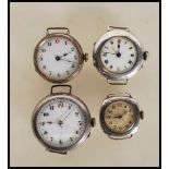 A selection of early 20th Century ladies silver wrist watches to include a square cased watch with