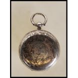 A early 20th Century silver hallmarked cased full hunter pocket watch having engraved central