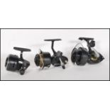 A group of three fishing reels to include a Mitchell 300C, an ABU 501 and a K. P. Morritt's Intrepid