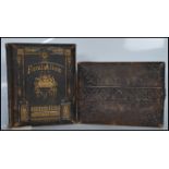 A 19th Century Victorian leather photograph album having metal lock with gilt page ends containing a