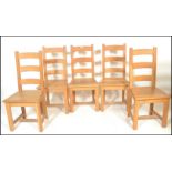 A set of good quality antique style solid oak country kitchen dining chairs. Raised on block legs
