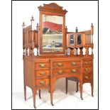 A late 19th century Victorian large walnut dressing chest with tall gallery back having a central