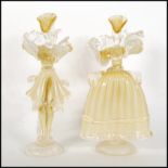A pair of mid century Italian Murano studio art glass hand blown figures of a man and woman