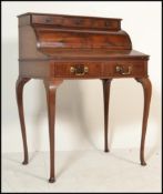 An Edwardian Queen Anne revival quality mahogany roll top / cylinder bureau desk. The cylinder