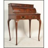 An Edwardian Queen Anne revival quality mahogany roll top / cylinder bureau desk. The cylinder