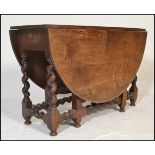 A good late 18th / 18th century barley twist large oak drop leaf / gate leg dining table together