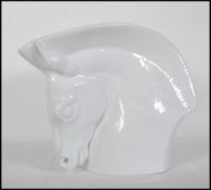 A large Royal Worcester Porcelain Art Deco style vase in the form of a stylised horse's head and