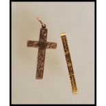 An early 20th Century Edwardian hallmarked 9ct gold crucifix pendant engraved with floral