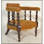 A Victorian barleytwist armchair raised on bobbin turned legs with yellow velour seat and elbow