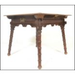 A late Victorian Arts and Crafts ecclesiastical solid oak table being in the manner of Morris &