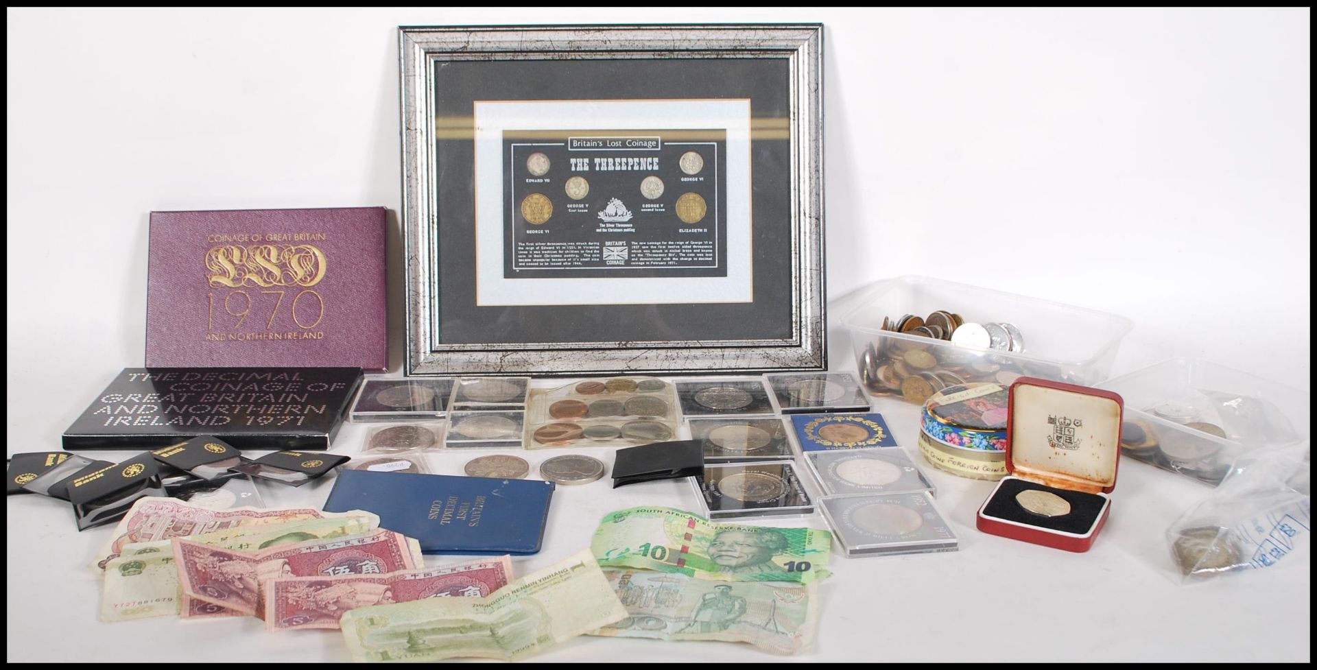A collection of British and world coins including early 20th Century pre decimal coins, a