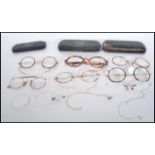 A small group of 20th Century folding spectacles glasses, most having metal frames, with some