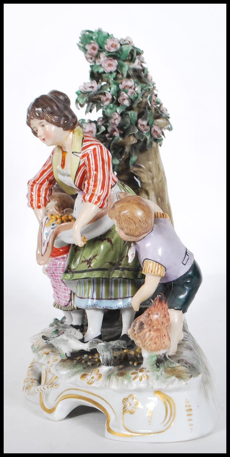 A late 19th Century Continental ceramic figurine group in the manner of Meissen. The group - Image 4 of 9