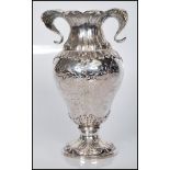A late 19th / early 20th Century continental silver vase of tapering form. The vase having molded
