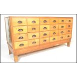 A good early 20th century 1930's Art Deco golden oak multi drawer vintage haberdashery shop