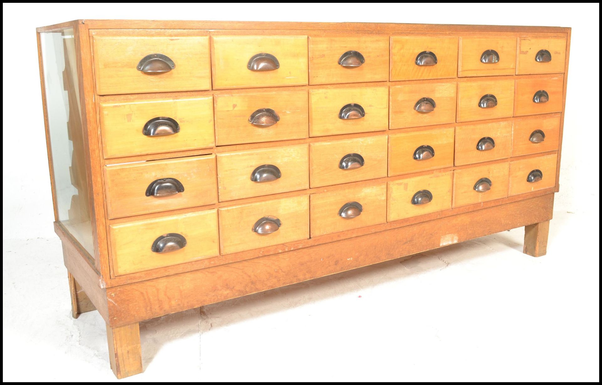 A good early 20th century 1930's Art Deco golden oak multi drawer vintage haberdashery shop